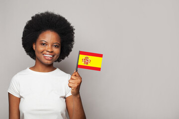Spanish woman holding flag of Spain Education, business, citizenship and patriotism concept