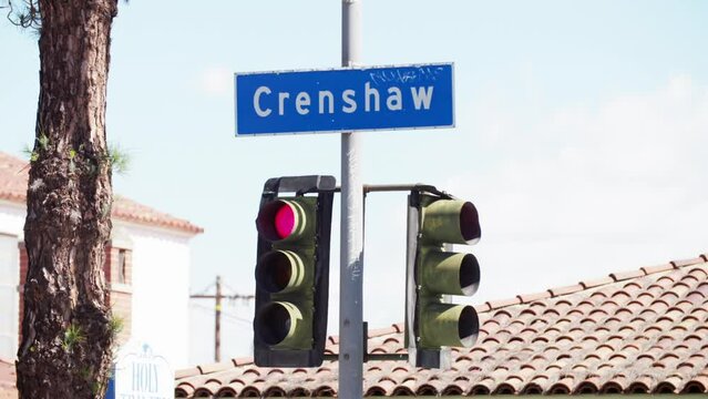 Lockdown Of Crenshaw Street Sign With A Changing Traffic Light  - Los Angeles, California