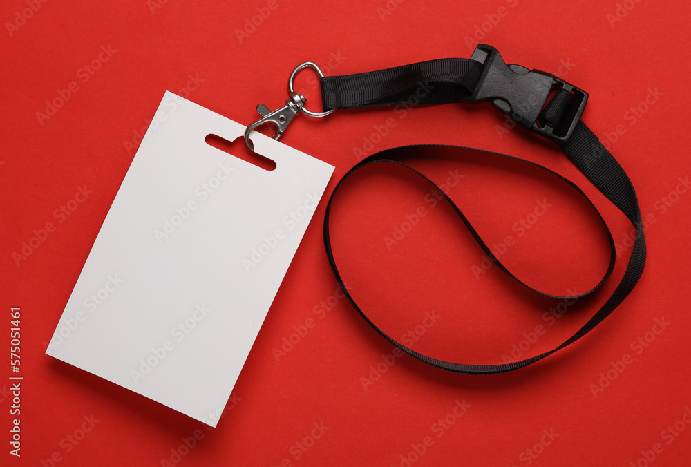Poster empty white id card badge mockup with black belt on red background. staff identity name tag. space f