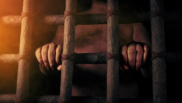Man Holds Prison Bars In Ancient Setting