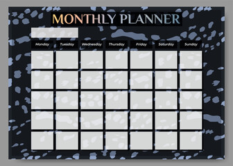 luxurious Monthly planner on deer skin background.