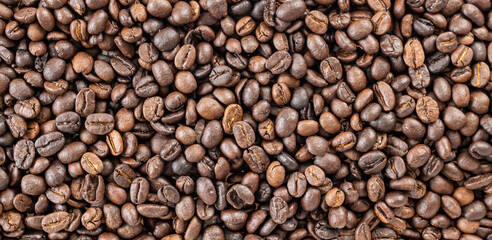Fresh roasted brown coffee beans background
