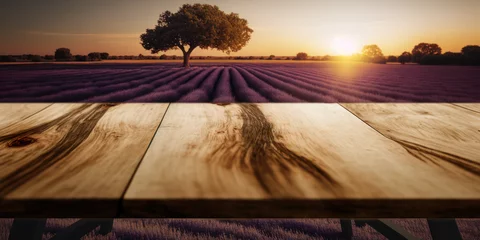 Zelfklevend Fotobehang table en bois au premier plan, pour présentation produit, mock-up, arrière plan champs de lavande en provence, effet bokeh © Sébastien Jouve