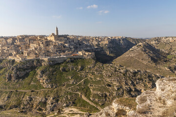 Panorama of Matera, a UNESCO World Heritage Site. European Capital of Culture. View from the Murgia Park. Timeless walk on Paleolithic caves and paths. City similar to Jerusalem. Unforgettable journey