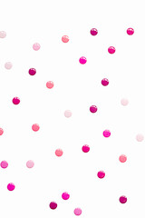 White basic background with chaotic identical dots of pink shades