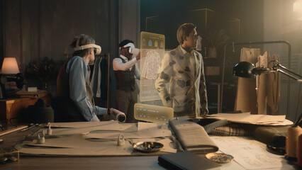 Tailor and male African American customer in VR headsets in atelier. 3D hologram of suit pattern....