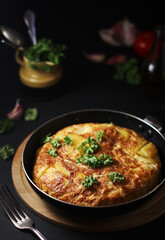 Traditional Spanish dish tortilla on the table