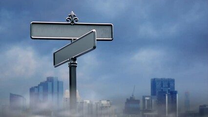 Blank street name sign over dramatic city view