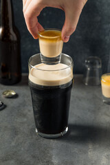 Fototapeta na wymiar Boozy Irish Bomb Shot Cocktail