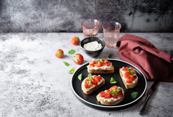 Strawberry ricotta sandwiches with mint leaves