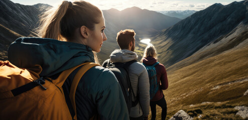 A group of friends hike up a mountain, dressed in sportswear and backpacks. One person, a young woman, stops to catch her breath and looks out at the stunning view (created with Generative AI) - obrazy, fototapety, plakaty
