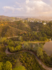 High-angle views taken from a drone of Lake Hollywood, or Hollywood Reservoir, in the Hollywood...