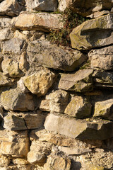 Coarse dry stone wall with large boulders and stones