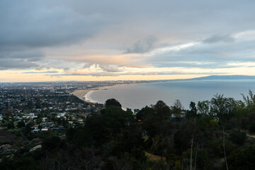 Sunset views from the Santa Monica Mountains while hiking, looking down on the city of Los Angeles and the Santa Monica Bay.