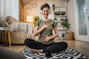 One woman sit on the floor practice online guided meditation self care