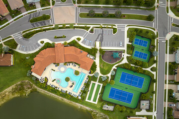 Aerial view of blue tennis courts for sports recreational activity