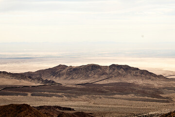 mountains of baja california where the border line with the usa can be seen in the distance