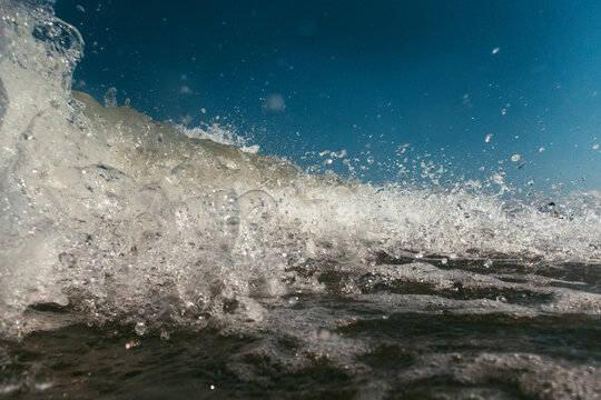 Wave Splashes Against Shore in Costa Brava Spain