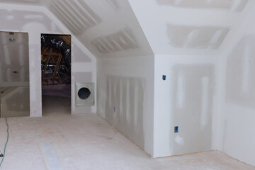 There has been significant amount of plastering drywalling completed in new house under construction, it is now ready for painting