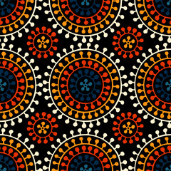 Seamless african shweshwe pattern. Blue, white, black and orange print for textiles. Cute doodle ornament. Vector illustration.