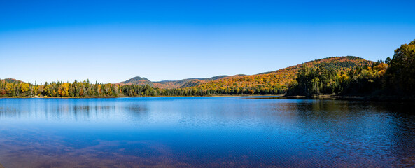 Panoramic view of beautiful autumn lake in a national park