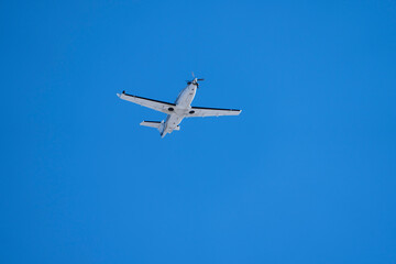 Fototapeta na wymiar Medic aircraft flying high above
