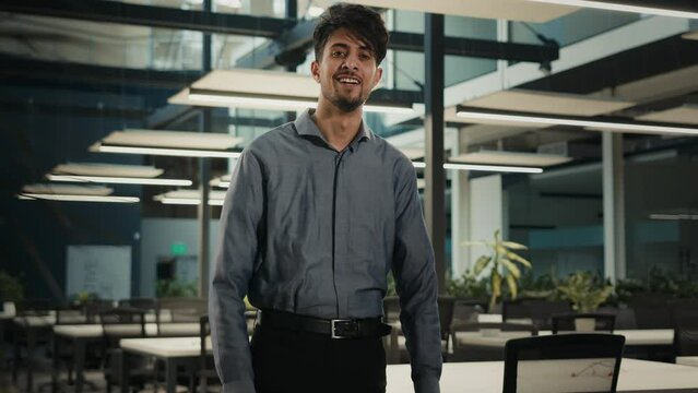 Business male portrait Indian Arabian man businessman ethnic multiracial adult guy middle-aged worker entrepreneur with folded arms posing in modern office corporation smiling happy employee indoors