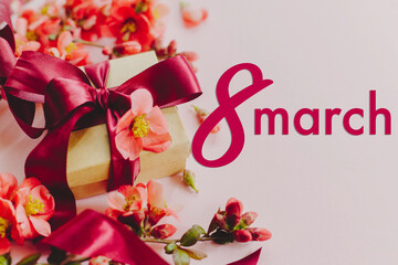Happy womens day greeting card. 8 march sign text and stylish gift box with flowers on pink...