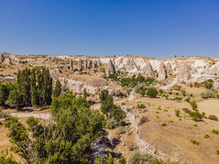Fototapeta na wymiar Unique geological formations in Love Valley in Cappadocia, popular travel destination in Turkey
