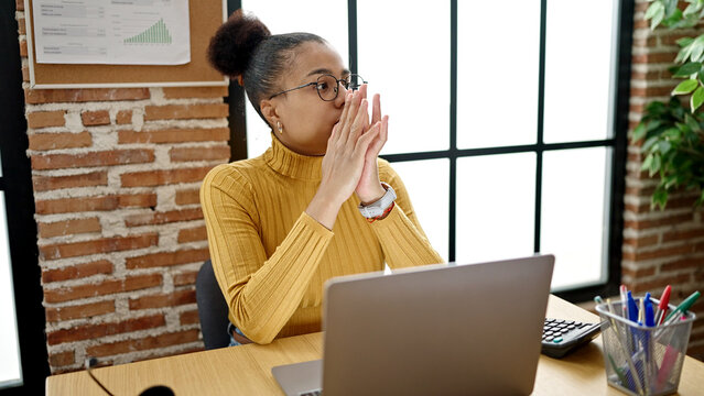 Young african american woman business worker using laptop thinking at office
