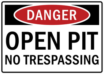Fototapeta premium Open pit hazard sign and labels no trespassing