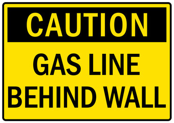Obraz premium Pipeline sign and labels gas line behind wall