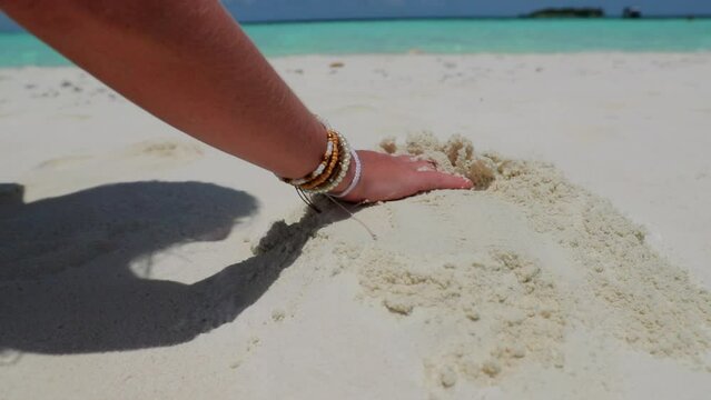 Slow Motion Shot Of Woman'S Hand Playing With Sand At Beach On Sunny Day - Thulusdhoo, Maldives