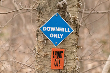 This sign was posted on the tree warning all hikers that this area would be downhill only. Also...