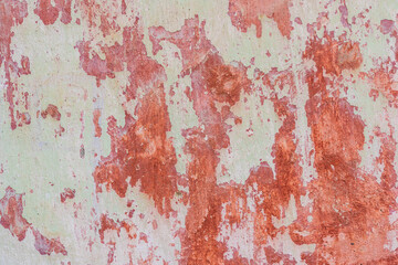 Rough textured wall surface with shabby paint. Backdrop for design, graphic resource