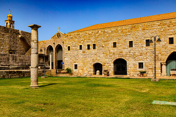 Lebanon. Beit Mary town. Deir al-Qalaa ("Convent of the Citadel"), 18th century Maronite Convent of St John the Baptist, built on top of the ruins Roman temple (on the left)