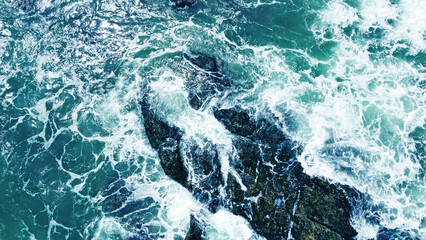 Aerial view of the sea storm waves. Beautiful ocean wallpaper for tourism and advertising. Asian landscape, photo from the drone