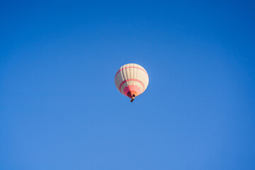 Fototapeta premium Beautiful hot air balloons over blue sky