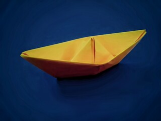 a Bright Yellow paper boats Origami On a Navy Background, from top, Blue, unique trendy, success.
