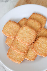 Potato chips biscuit on a white plate. Delicious crispy potato chips biscuits in plate. Space for text. Top view. Sweet potato buttermilk biscuits homemade for breakfast