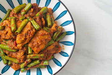 Stir fried pork with red curry paste