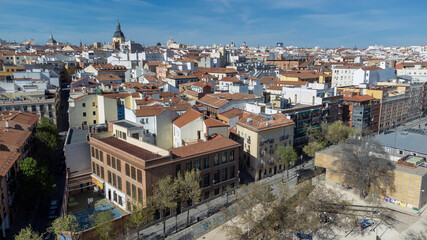 Fototapeta na wymiar Madrid, Spain. April 17, 2022: Landscape with architecture and blue sky in the city.