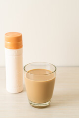 coffee latte glass with ready to drink coffee bottles