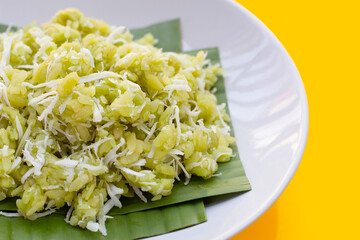 Green rice Thai dessert with coconut (Khao Mao)