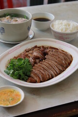 Steamed duck Thai cuisine in dish on white street food Thailand or food Chinese