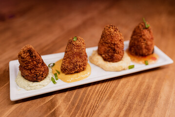 Appetizer - Artisan coxinha stuffed with shredded chicken with cream cheese