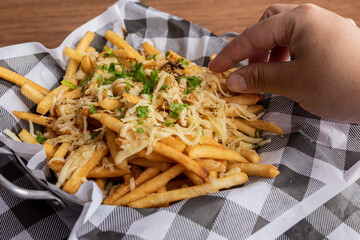 Appetizers - French Fries with Sausage and Parmesan Cheese Gratin