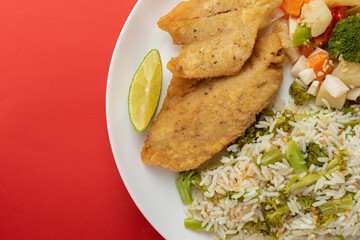 Meal - Fish fillet, rice with broccoli, beans, vegetables in butter and salad