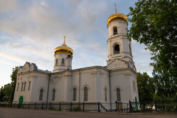 Fototapeta na wymiar Ancient Epiphany Cathedral in the early July morning. Vyshny Volochek. Tver region, Russia