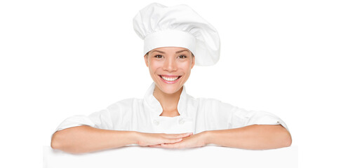Chef or baker woman showing blank empty billboard sign. Beautiful smiling happy chef leaning on placard banner with copy space for menu or other text. Isolated cutout PNG on transparent background